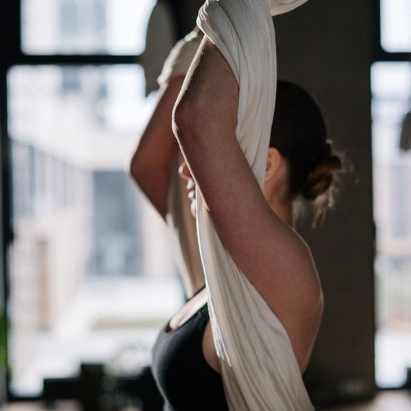 Woman enjoying the benefits of a healthy lifestyle and flexibility